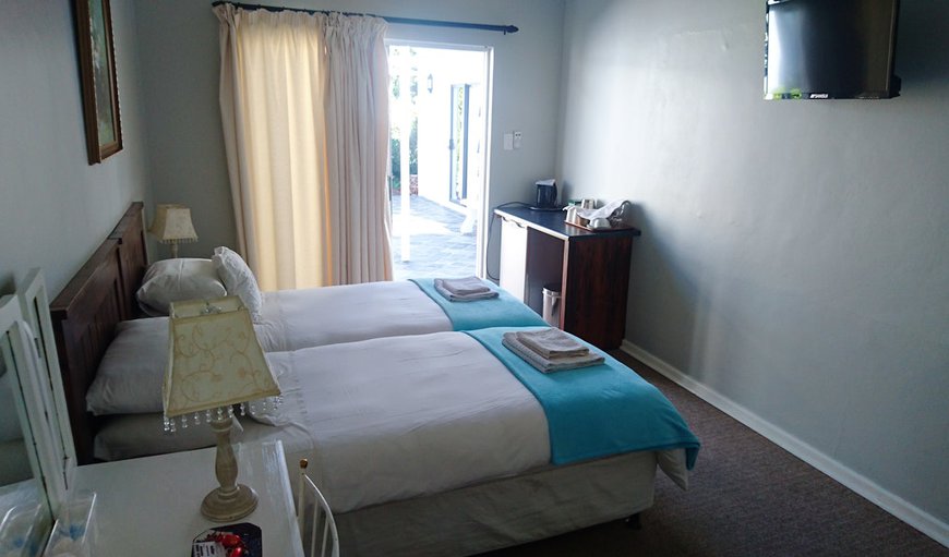 Room 4: Room 4 - This bedroom offers 2 single beds